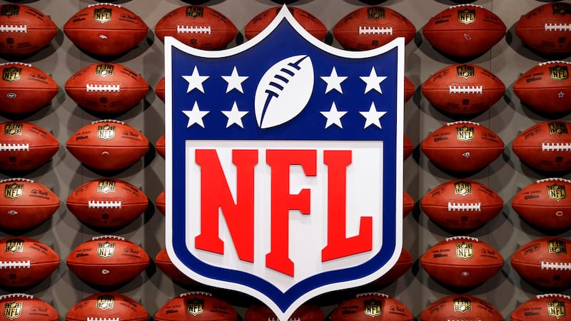 FILE - In this Nov. 30, 2017, file photo, an NFL logo is displayed at the opening of NFL...