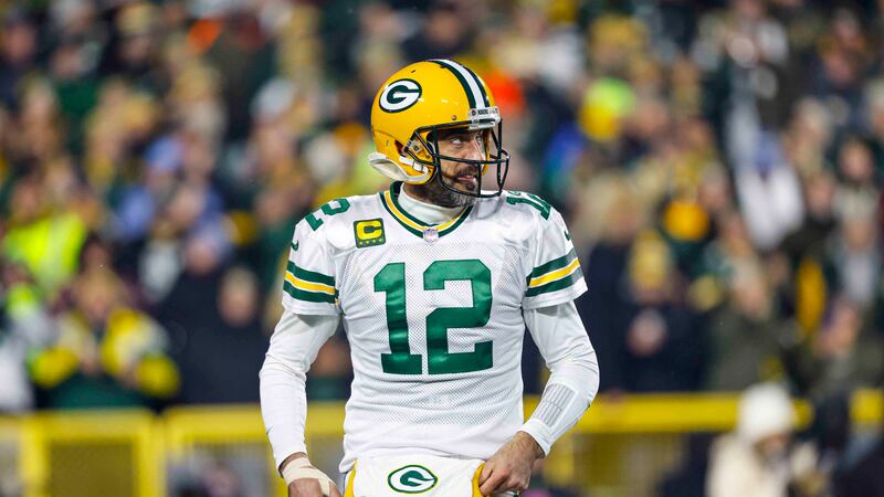 Green Bay Packers quarterback Aaron Rodgers (12) stands on the field during an NFL football...