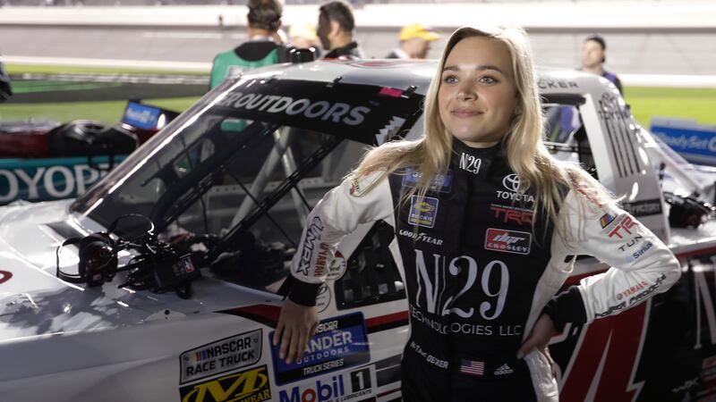 Natalie Decker stands by her truck before the NASCAR Truck Series auto race at Daytona...