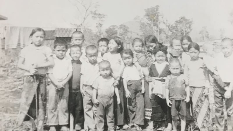 A group of children gathered at Ban Vinai refugee camp in Thailand in the 1970s.