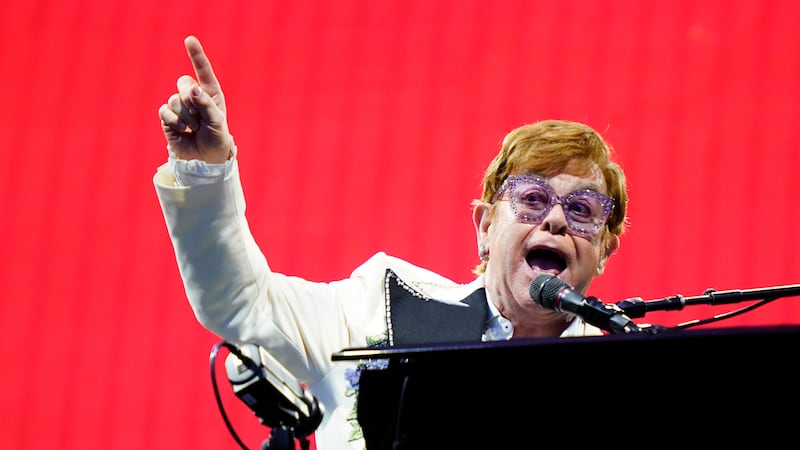 FILE - Elton John performs during his "Farewell Yellow Brick Road," tour, Friday, July 15,...