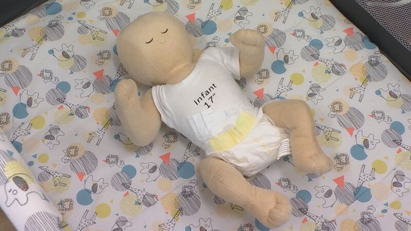 The Center for Childhood Safety in Brown County demonstrates the proper and safe way for an...