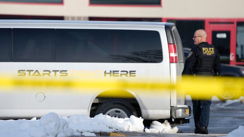 A law enforcement officer walks outside the Starts Right Here building, Monday, Jan. 23, 2023,...