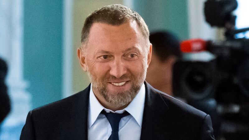 FILE - Russian metals magnate Oleg Deripaska attends a meeting of Russian President Vladimir...