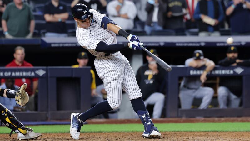 FILE - In this photo, New York Yankees' Aaron Judge hits his 60th home run of the season,...