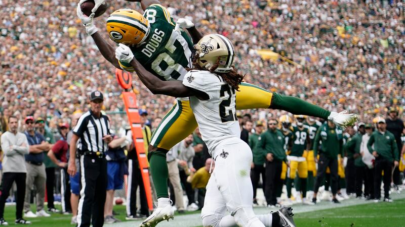 Green Bay Packers wide receiver Romeo Doubs (87) pulls in a touchdown reception against New...