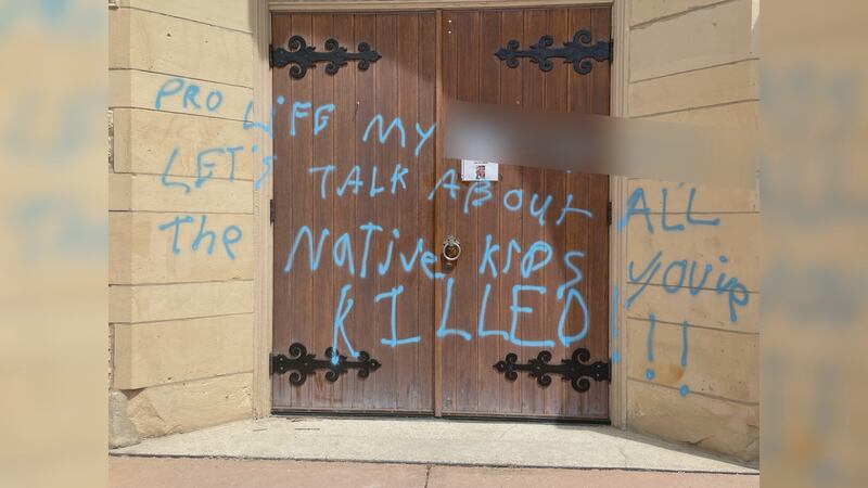 The Church’s front door and signage were damaged by graffiti.